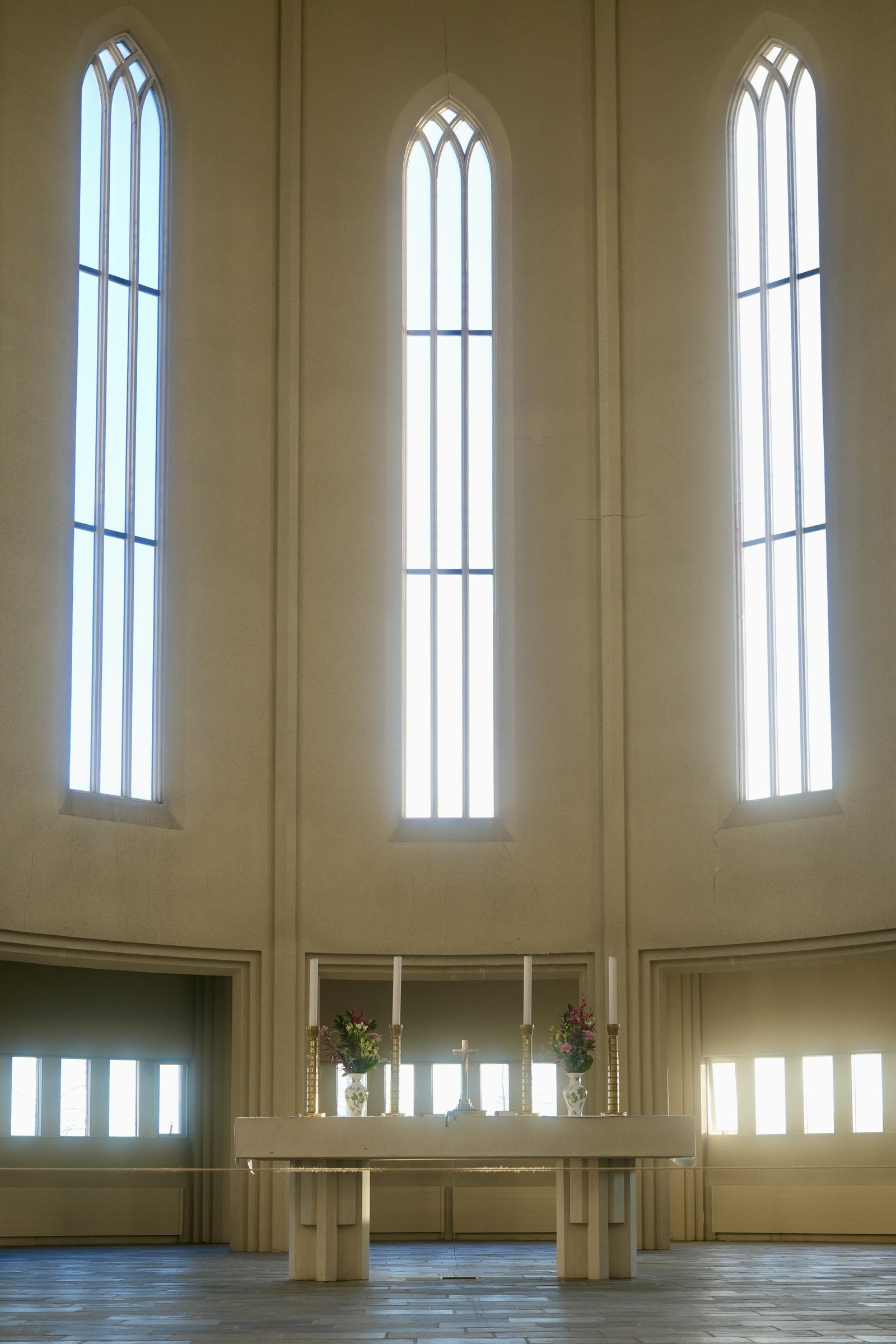Tall windows inside a quiet hall