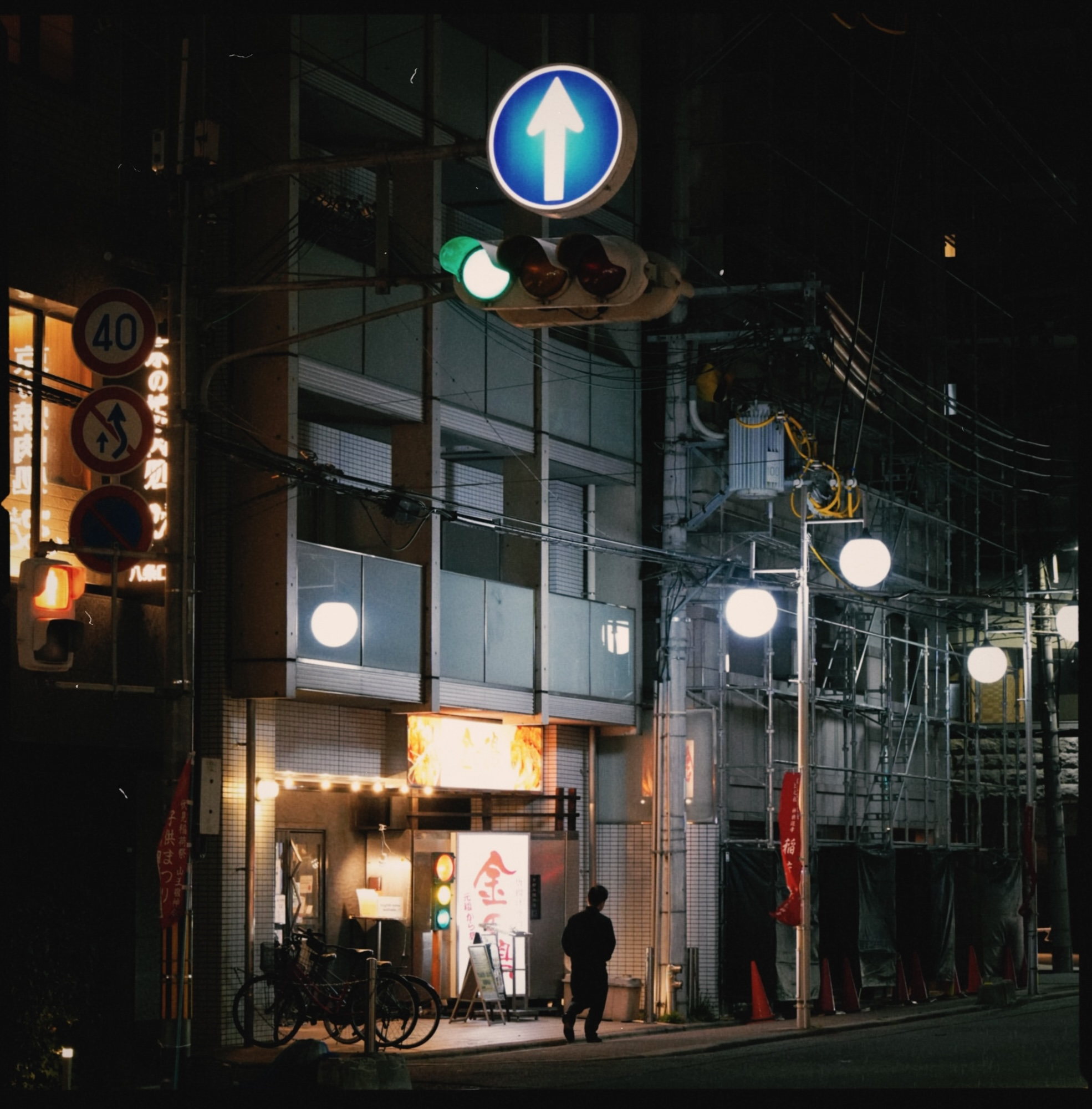 Neon-lit street corner at night